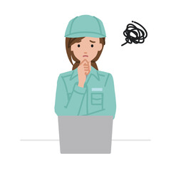 デスクで座ってPCを開いて困っている作業員の女性
