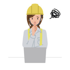 デスクで座ってPCを開いて困っている工事現場の女性