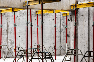 Formwork supports the second floor of a monolithic building. Reinforcement of walls and ceiling....