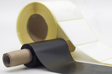 Black roll wax ribbon for thermal transfer on core and white self-adhesive label roller for a...