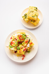 Khaman Dhokla chaat is a very simple and refreshing fusion chaat recipe made using leftover dhokla