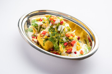 Khaman Dhokla chaat is a very simple and refreshing fusion chaat recipe made using leftover dhokla