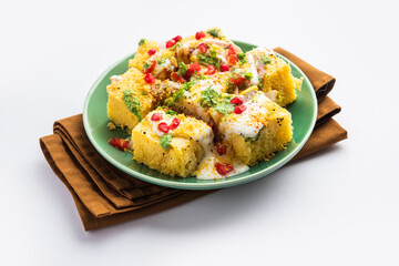 Khaman Dhokla chaat is a very simple and refreshing fusion chaat recipe made using leftover dhokla