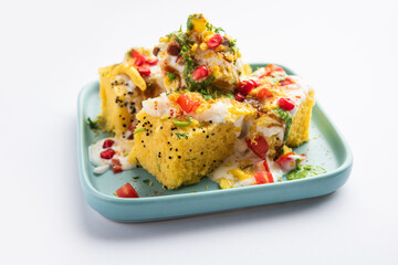 Khaman Dhokla chaat is a very simple and refreshing fusion chaat recipe made using leftover dhokla