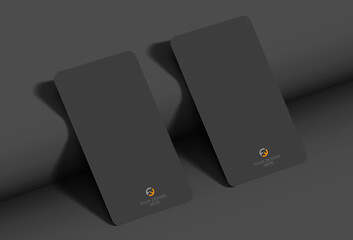 Mockup of a realistic business card with rounded corners, on a textured background with realistic shadows. Vector illustration EPS 10