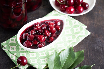 cherry jam and fresh cherries in a bowl, homemade preserves