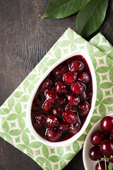 cherry jam and fresh cherries in a bowl, homemade preserves