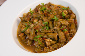 Bhindi masala or ladies finger fry served with indian roti chapati or Indian Flat bread. High quality photo