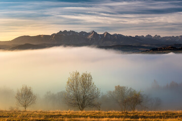 A foggy, autumn morning in the Pieniny Mountains with a view of the Tatra Mountains. 
Mglisty,...