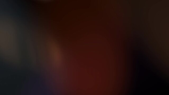 Light projection of multicolored highlights on a black background