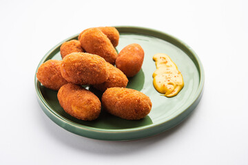 Macher Chop - Bengali style fish cutlet or pakora, a popular festival snack from west Bengal