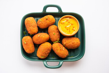 Macher Chop - Bengali style fish cutlet or pakora, a popular festival snack from west Bengal