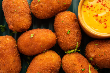 Macher Chop - Bengali style fish cutlet or pakora, a popular festival snack from west Bengal