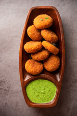 Macher Chop - Bengali style fish cutlet or pakora, a popular festival snack from west Bengal