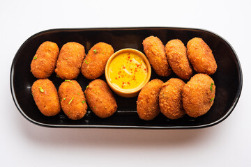 Macher Chop - Bengali style fish cutlet or pakora, a popular festival snack from west Bengal