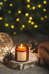 Holiday candle in a glass jar with label mock up
