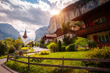 Fototapeta na wymiar Gorgeous view of the picturesque alpine town of Lauterbrunnen. Swiss alps, Switzerland, Europe.