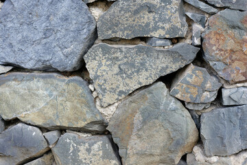 Old Stone wall brown, grey  light blue colour.
