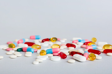 Many different colorful medication and pills perspective view. Set of many pills on colored background