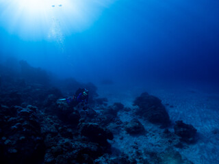 Fototapeta na wymiar Divers and deep seascape of Reunion island