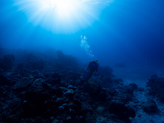 Fototapeta na wymiar Divers and deep seascape of Reunion island