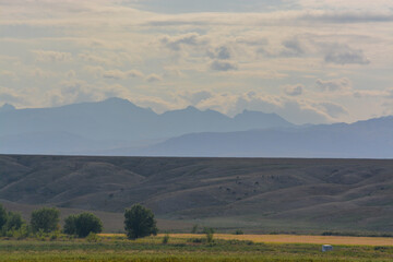 Obraz premium Alatau Zhetysu mountains and hills. End of summer. Cloudy day. Kazakhstan.