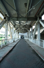 A picture with noise effect under bridge pedestrian walkway in Klang.