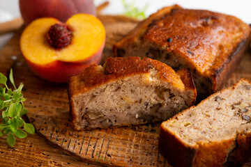 Fototapeta na wymiar Vegan cake with peach and banana. Traditional recipe.