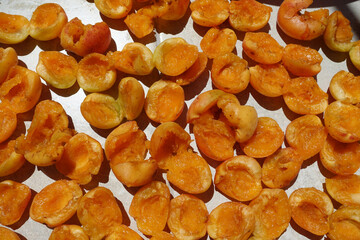 close-up apricot drying process, fruit drying process in summer, drying fruit in the sun,