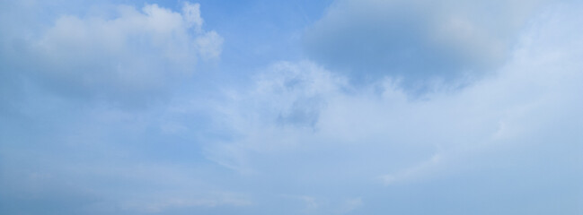 Abstract blue sky white cloud on the light of the sun background with empty copy space for add text or advertise design creative