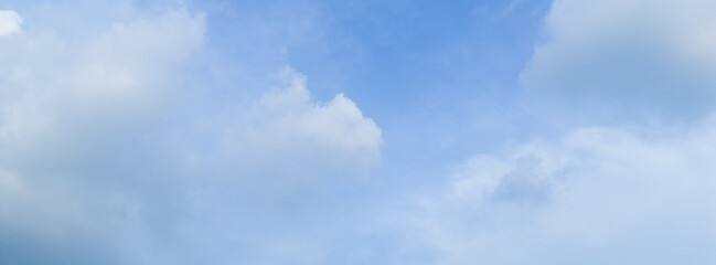 Obraz premium Abstract blue sky white cloud on the light of the sun background with empty copy space for add text or advertise design creative