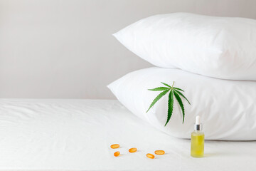 Melotonin production, pills, capsules and cbd oil on the bed. Concept sleep disorder. beat insomnia...