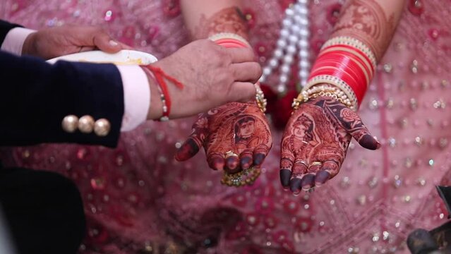 A Slow Motion Shot of Rituals being done with an Indian Couple at their Indian Wedding in India