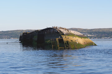 Shipwreck sugar boat at sea on the River Clyde viewed from Firth of Forth Scotland
