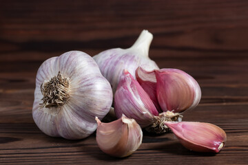 Garlic bulb on wooden background. Close up
