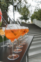 outdoor bar. empty glasses and big jar with refreshment drink. High quality photo