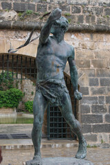 Naklejka premium Palma de Mallorca, Mallorca, Spain - 05.03.2022: Es Foner (The Slinger) statue in Palma de Mallorca, Spain