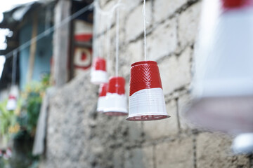 decoration of the red and white flag representatives using colored drinking cups to celebrate Indonesian independence day