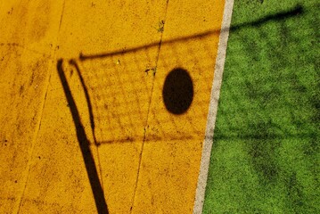 Shadow on the volleyball court, a beautiful picture for the poster