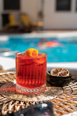 Classic cocktail Negroni with gin, campari and martini rosso. Traditional recipe