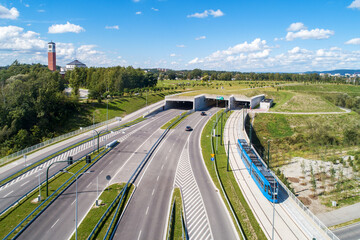 New city highway in Krakow, Poland, called Trasa Łagiewnicka with separate tunnels for cars and...