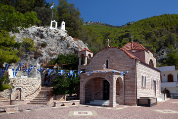 &Tau;he church of the Dormition of the Virgin ,in the monastery of Saint Patapios  in Loutraki,Corinthia, Peloponnese,  Greece. Sunny summer day with blue sky