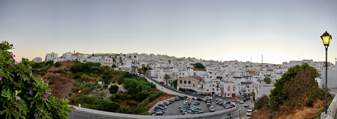 Panoramic view of the town of the province of Cadiz, Vejer de la Frontera seen from the city walls at dusk with a lamp on