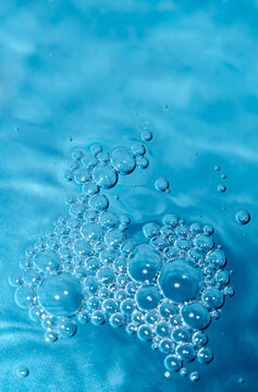 Water bubbles blue background