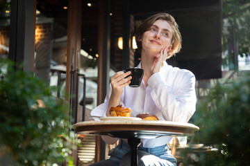 Business woman enjoy lunch meal and dessert at restaurant management discussion for new projects. Consultant in casual restaurant cafe, young small business startup entrepreneur.