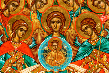 Close-up detail of an orthodox icon depicting the Synaxis of the Holy Archangels painted in the Byzantine style.