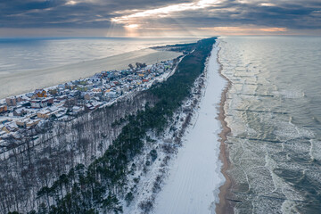 Hel peninsula and snowy beach. Baltic Sea at winter, Poland.