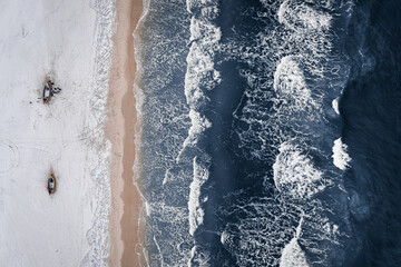 Top view of fishing boats at Baltic Sea in winter