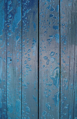 Fototapeta na wymiar Wooden planks painted in loft style with water drops vertical background 