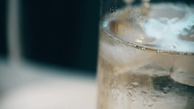Carbonated drink with ice and bubbles